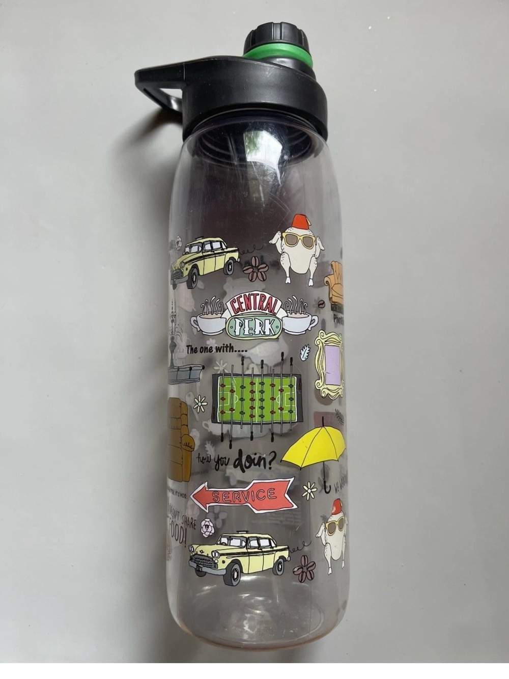 Central Perk Themed Clear Water Bottle with Black Lid and Green Accent